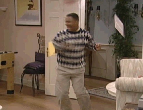 Carlton of "The Prince of Bel Air" doing his signature dance, then climbing on the couch and doing a backflip...while papers flutter around him.